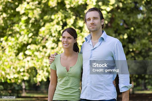 Happy Young Couple Embracing Each Other Stock Photo - Download Image Now - 20-24 Years, 20-29 Years, Adult