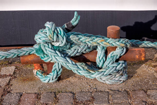 istock Rope and bollard at a pier in Copenhagen harbor 1380329085