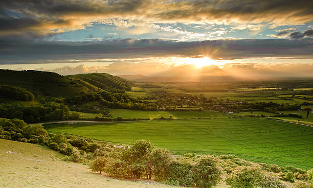 istock Stunning Summer sunset over countryside escarpment landscape 138033529