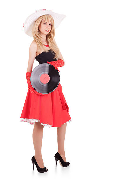 istock Retro stylish young woman with gramophone record 138033952