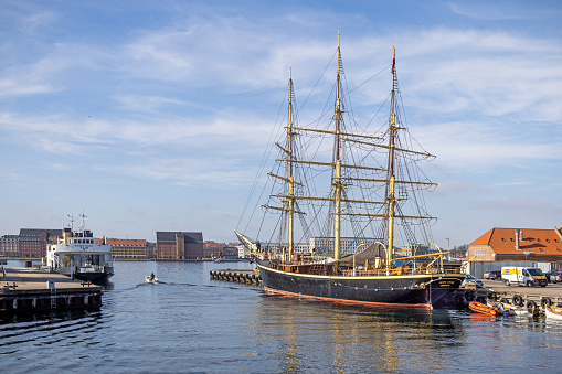traditionally-rigged ship under sails along Swedish coast