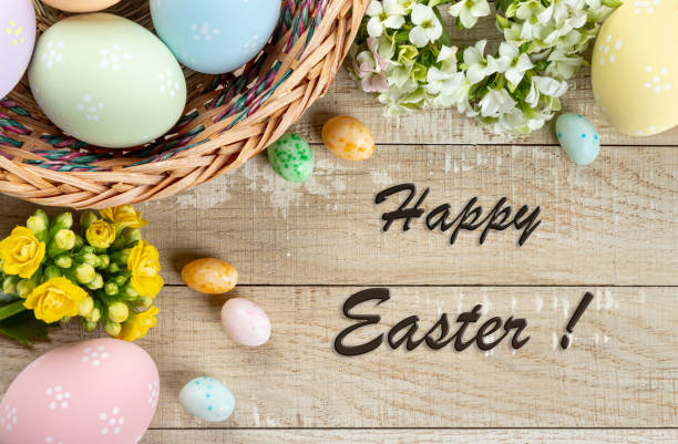 istock Easter border of decorated eggs and flowers 1380354244