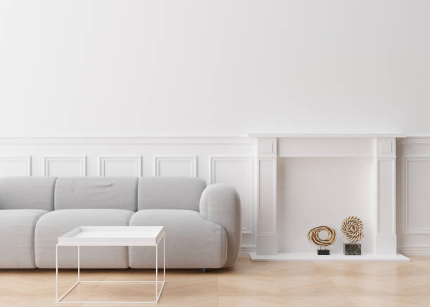 istock Empty white wall in modern living room. Mock up interior in contemporary style. Free, copy space for picture, poster, text, or another design. Sofa, table, sculptures. 3D rendering. 1380356432