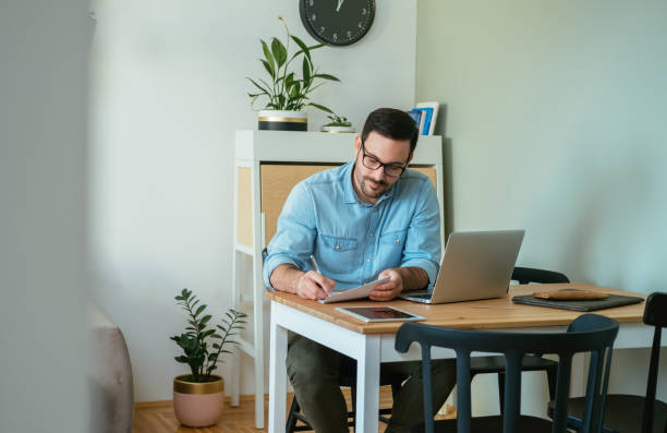 istock Successful Happy Businessman Working at Home Office 1380358636