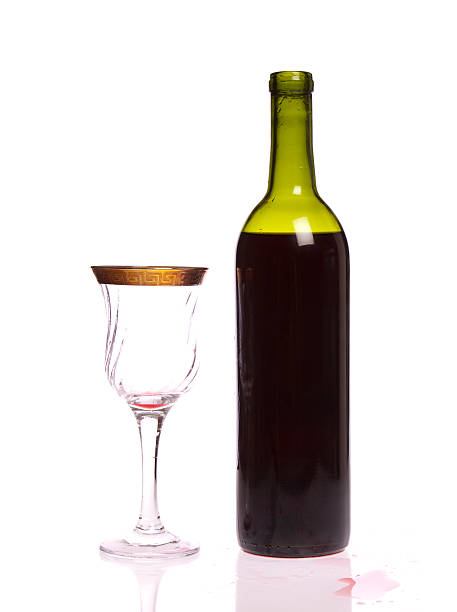 Wine bottle and goblet stock photo