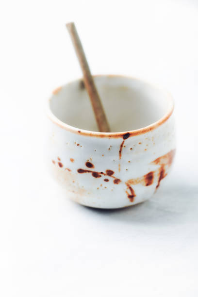 istock Traditional, handcrafted ceramic on bright wooden background. Soft focus. Close up. 1380390578