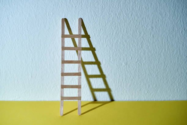 istock toy ladder on color background 1380394444
