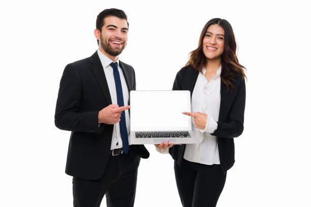 istock Smiling sales representatives promoting a product 1380396162