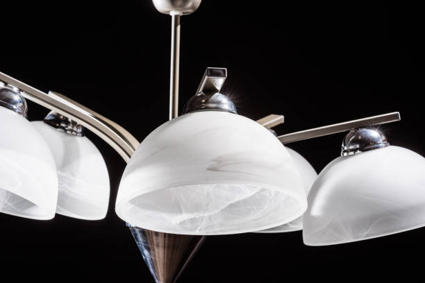 istock Modern lamp, chandelier on a black background. Lighting element of the interior. 1380402398