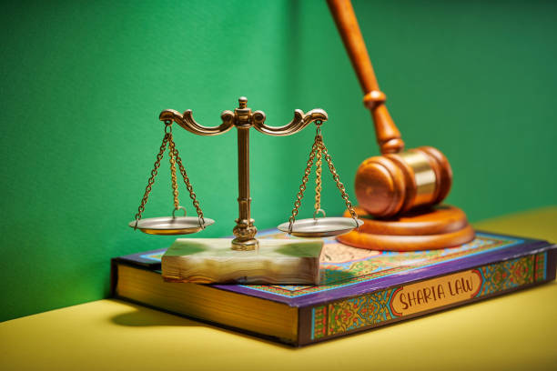 sharia law - libra scale gavel hammer and holy koran sharia law - libra scale gavel hammer and holy koran sharia stock pictures, royalty-free photos & images