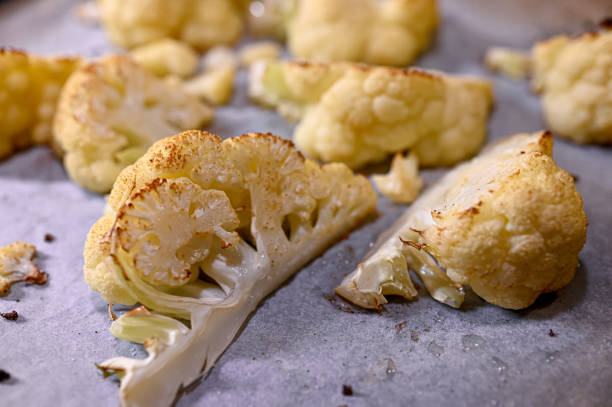 istock pieces of roasted cauliflower on baking paper 1380403992