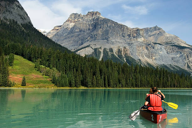 Kayakers on Emerald Lake in Yoho National Park Yoho National park, Canada yoho national park photos stock pictures, royalty-free photos & images