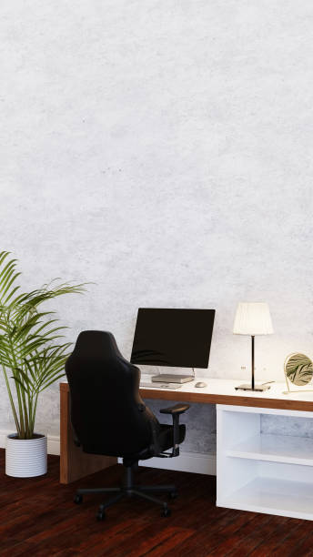 istock background of office working room with table computer and office chair, 3D rendering 1380443289