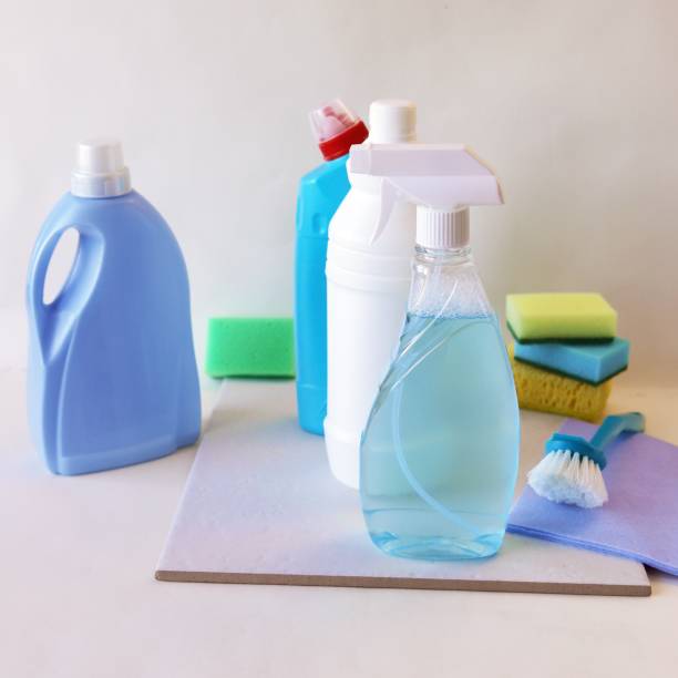 istock Liquid detergents in plastic bottles, home cleaning products on the table, light background 1380466169