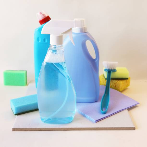 istock Liquid detergents in plastic bottles, home cleaning products on the table, light background 1380466181