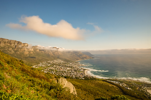 A view of Camps Bay South Africa.  Camps Bay is a short drive from Cape Town and is an eclectic little town on a beautiful beach.