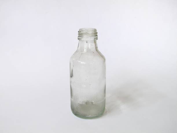 istock Used glass bottles on a white background 1380470653