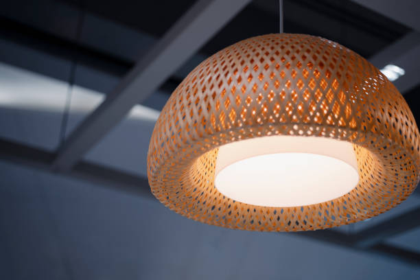 istock Woven bamboo lamp with black gray steel frame background 1380482763