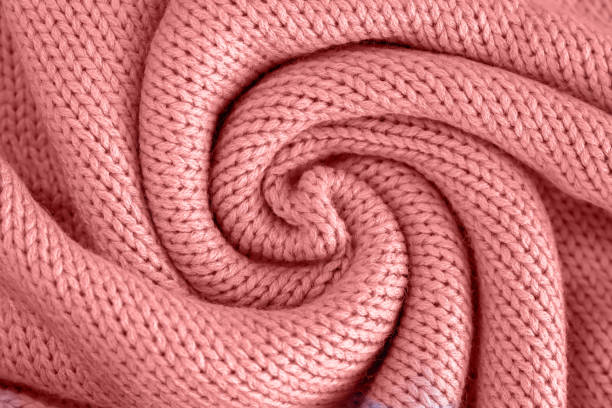 istock Texture of knitted woolen pink cloth sweater 1380485520