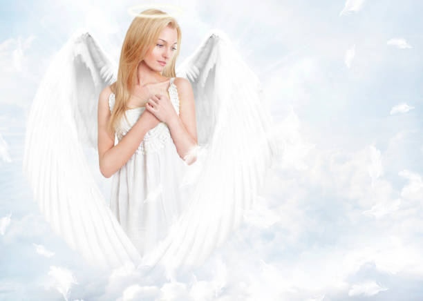 istock Young woman as angel with white wings and aureole 138049685