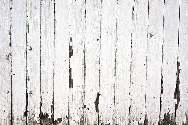 Peeling paint on wooden fence stock photo