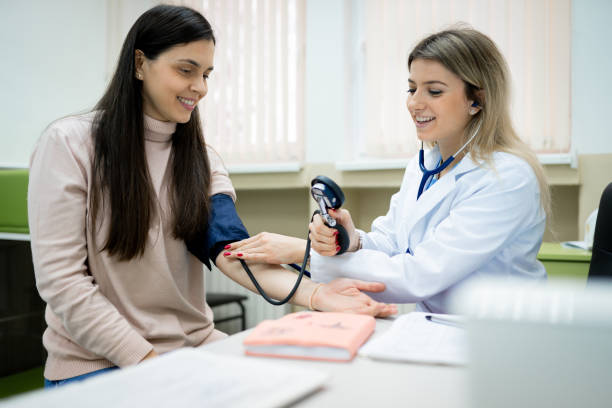 istock The doctor measures the patient's pressure 1380574533