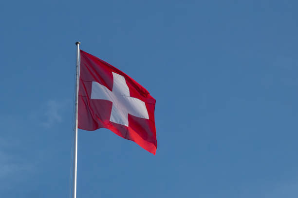 Swiss Flag - National Flag of Switzerland Swiss Flag - National Flag of Switzerland swiss flag photos stock pictures, royalty-free photos & images