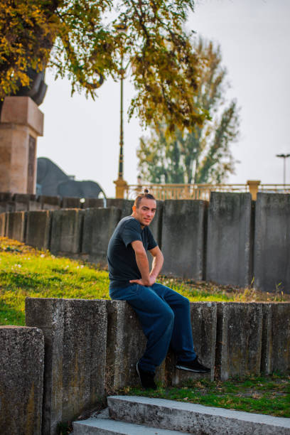 istock Parkour man resting after hard parkour training 1380607507