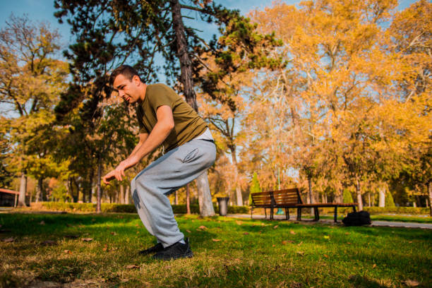 istock Fitness man training parkour exercise outdoor 1380617549
