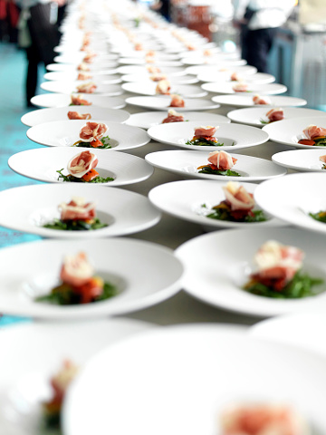 Rows of Italian Ham Salad Starters Plated up for the feast/wedding/conference/banquet.