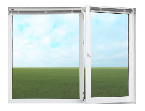 istock Blue sky with clouds over green meadow, view through plastic window 1380674057