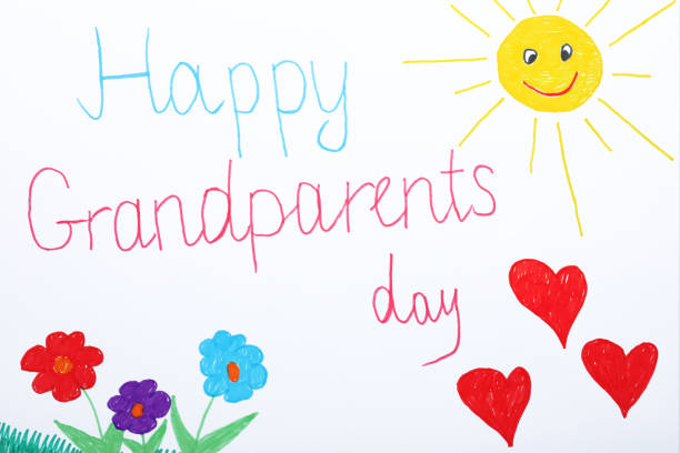 istock Beautiful drawing with phrase Happy Grandparents Day, top view 1380679905