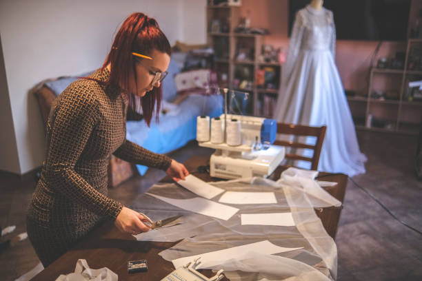 istock Making a design for wedding garment out of paper 1380683194
