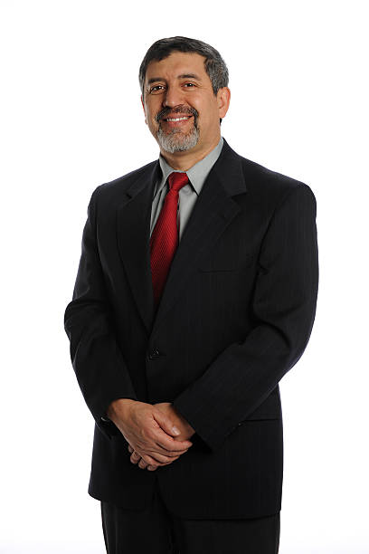 istock Smiling Hispanic businessman isolated on white background 138069353