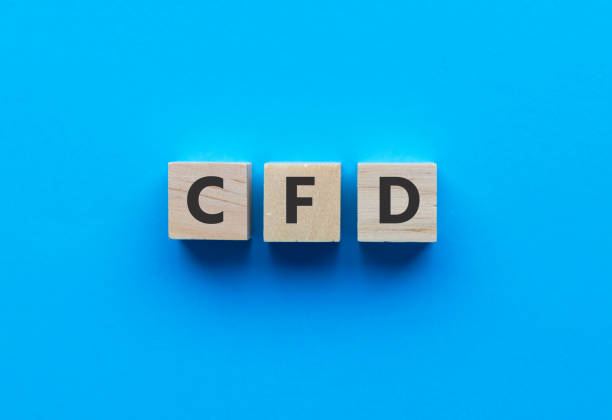 istock Text CFD on wooden cubes on bright blue background. Abbreviation from 'Contract for difference'. Business and finance concept. 1380694854