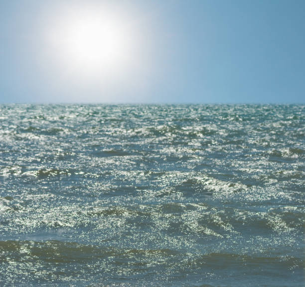 istock emerald stormy sea bay at the sunny day 1380698696
