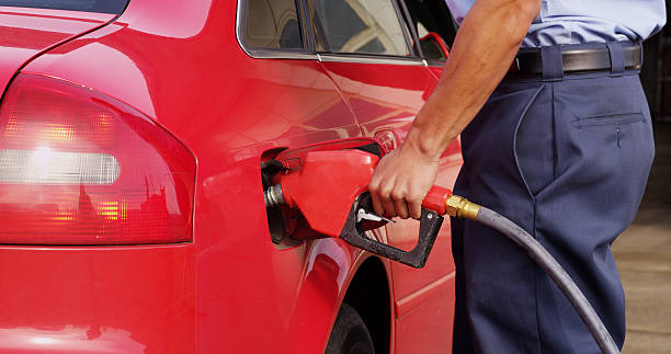 istock Gas station worker pumping fuel, closeup 138070071