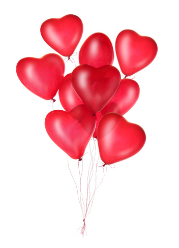 Group of red heart balloons isolated on white background