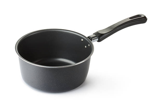 Stewpot with non-stick coating Stewpot with non-stick coating. Isolated on a white. polytetrafluoroethylene photos stock pictures, royalty-free photos & images