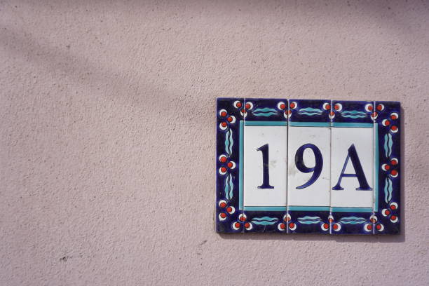 istock 19a sign hanging on the wall, ceramic address sign 1380727641