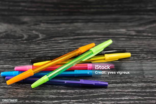 Colorful Pens On A Black Table Stock Photo - Download Image Now - Art, Color Image, Creativity