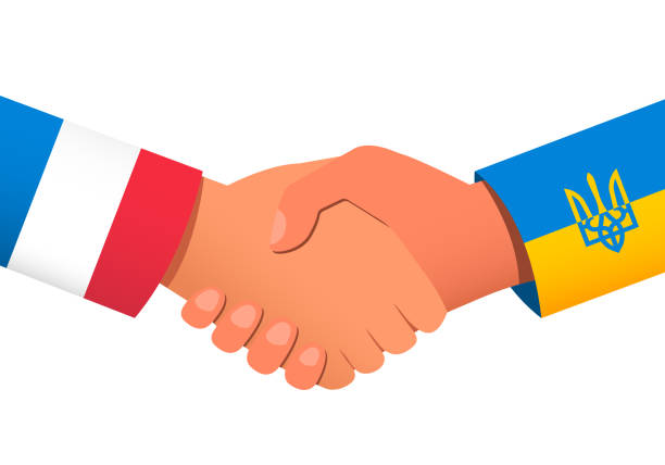 Handshake between France and Ukraine as a symbol of financial or political relations and assistance. Vector illustration EPS 10 Handshake between France and Ukraine as a symbol of financial or political relations and assistance. Vector illustration EPS 10 alliance nebraska stock illustrations