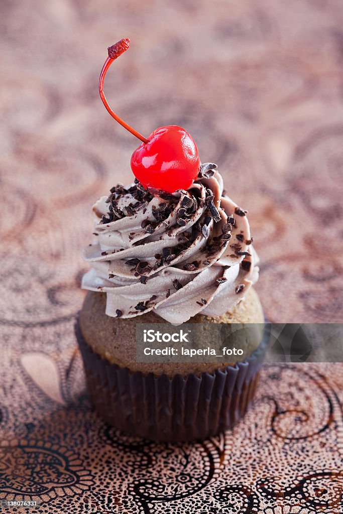 Chocolate cupcake Chocolate cupcake with cherrie, selective focus Baking Stock Photo