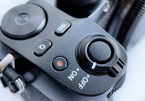 istock Close-up of the cameras shutter lever, iso sensitivity selection buttons, quick menu and video recording mode 1380764476