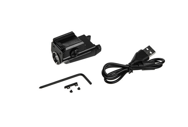 istock Special weapon flashlight with mount. Modern metal LED flashlight in black color. Portable flashlight isolate on a white background. 1380829266