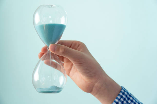 istock Child with hourglass 1380859173