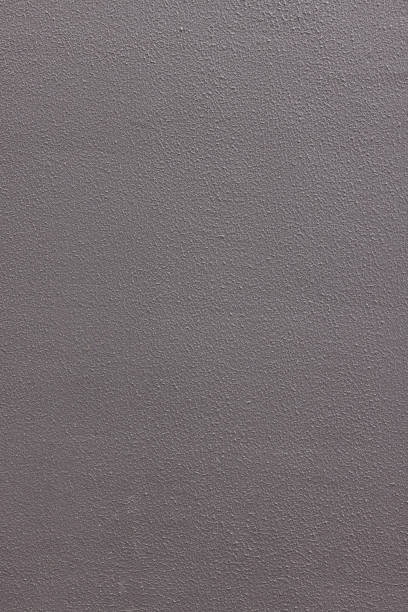 istock Part of a textured painted concrete wall 1380861311
