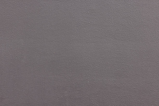 istock Part of a textured painted concrete wall 1380861821