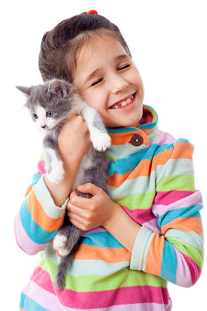 istock Happy little girl cuddle kitten 138087905
