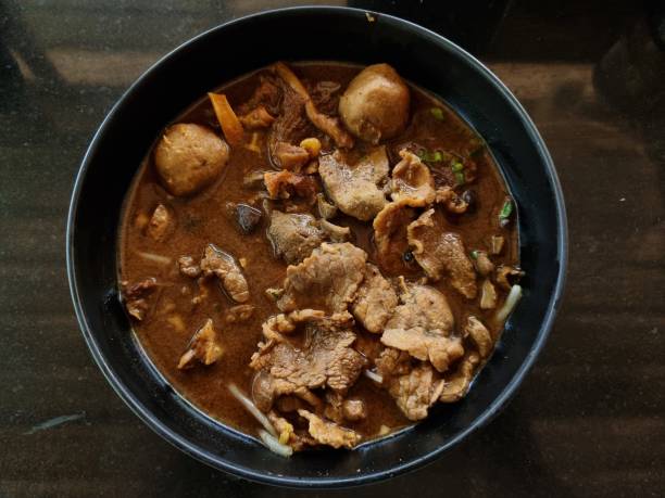 istock Corned Beef Tenderloin with thickened soups and meat balls in a cup. focus a point of object. 1380883730